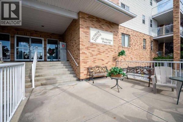 Den - 439, 165 Manora Place Ne, Calgary, AB T2A7X5 Photo 3