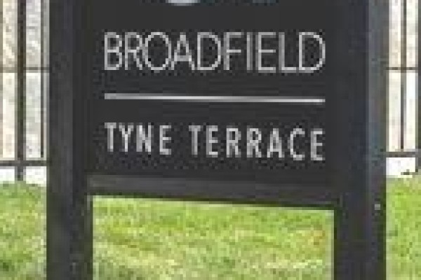 Sign with "BROADFIELD" and "TYNE TERRACE" on black background. - 44 - 51 Broadfield Drive, Toronto