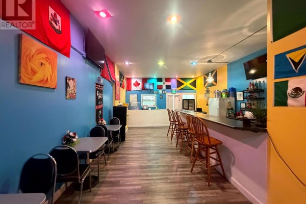 Interior view of a bar area with stools and a service counter at the back. - 44 Robinson Street, Norfolk