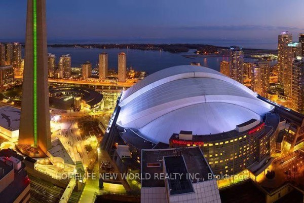 View of Lake Ontario, CN Tower, and Rogers Centre dome from above. - 4406 - 300 Front Street W, Toronto