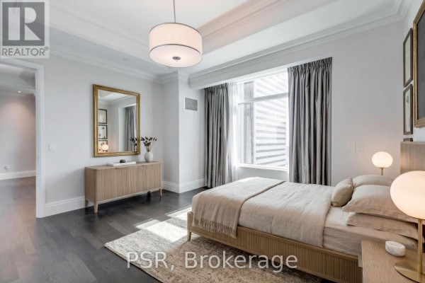 Bathroom featuring marble finishes, a walk-in shower, and a separate bathtub - 4406 - 311 Bay Street, Toronto