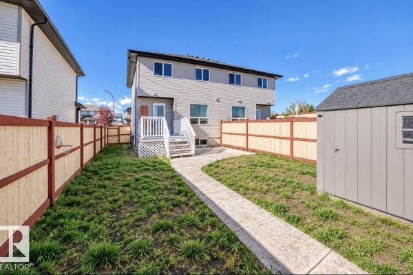Family room - 447 Songhurst Pl, Leduc, AB T9E0P9 Photo 4