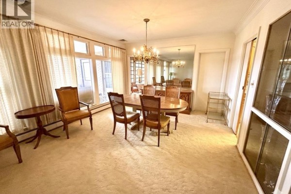 Oval dining table and chairs with chandelier - 4470 Riverside Windsor