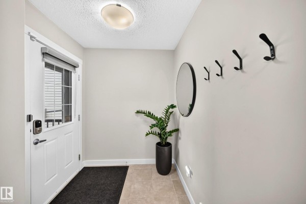 Family room - 4477 Annett Cm Sw, Edmonton, AB T6W2V7 Photo 4