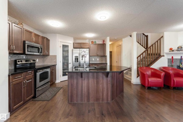 Family room - 448 Reed Cr, Leduc, AB T9E0R5 Photo 4