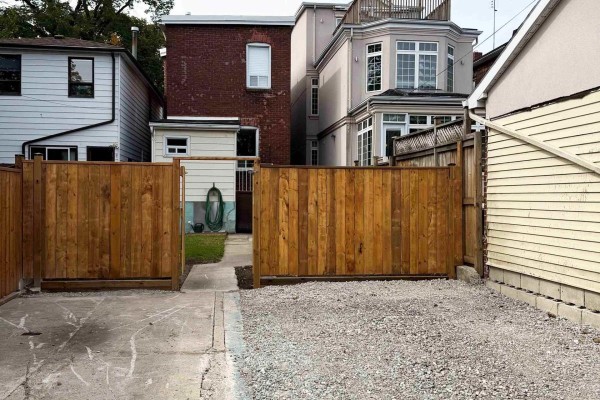 Aerial view of Toronto laneway with garages, backyards, and residential homes. - 45 Eaton Avenue, Toronto