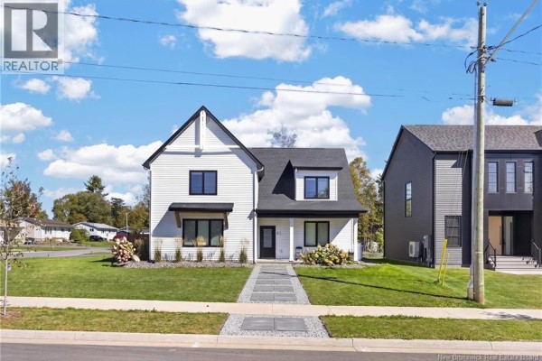 View of the front facade of the white residential building with a paved walkway leading to the front door. - 45 Kimberley Street, New Maryland