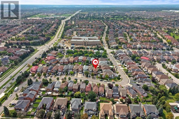 Aerial view of suburban neighborhood with houses and streets - 45 Sahara Trail Brampton