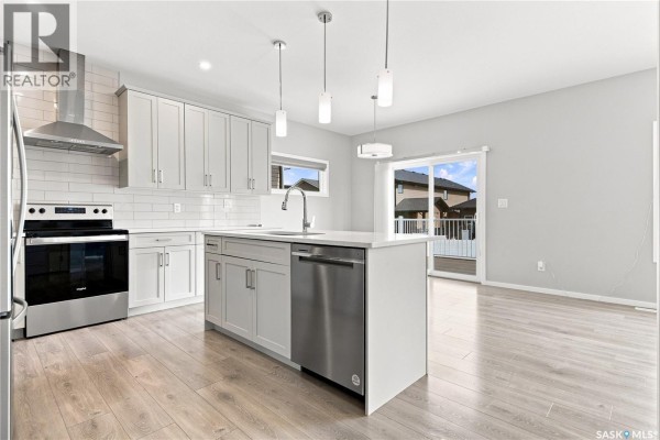 Den - 450 Aniskotaw Way, Saskatoon, SK S7V1M3 Photo 5