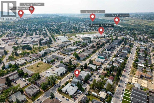 Aerial view of the neighborhood showing the townhouse location with nearby amenities marked. - 4510 73 Street Nw, Calgary