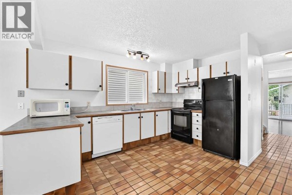 Dining room - 454 20 Avenue Nw, Calgary, AB T2M1C4 Photo 4
