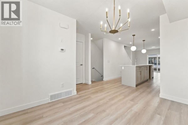 Living room - 46, 200 Belmont Street Sw, Calgary, AB T2X5X5 Photo 4