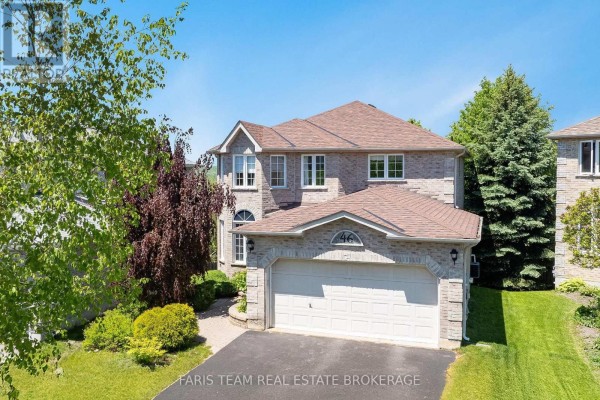 Aerial view of a residential house with a grey shingled roof and attached two-car garage. - 46 Bell Street, Barrie