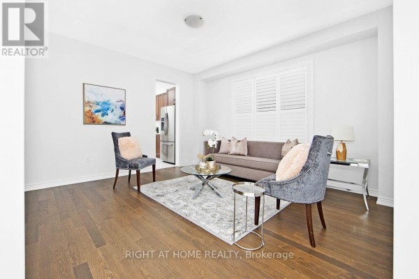 Family room - 46 Frederick Taylor Way, East Gwillimbury, ON L0G1M0 Photo 5