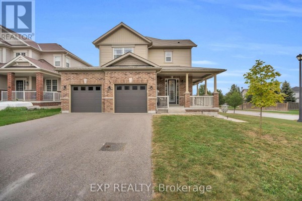 Front view of a two-story house with a two-car garage and covered front porch. - 46 Rennie Street, Brock