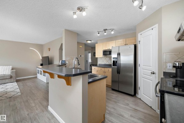 Family room - 4616 191 St Nw, Edmonton, AB T6M2Y2 Photo 4