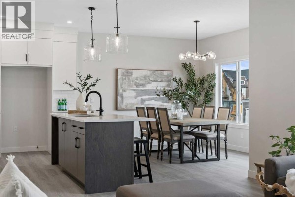 Interior design mood board with samples of cabinetry, countertops, tile, flooring, and lighting. - 470 Baywater Green, Airdrie