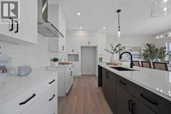 Second floor layout showing a loft, bedroom, laundry room, and two bathrooms. - 470 Baywater Green, Airdrie