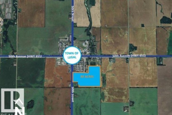 Map view showing a large parcel of land with a red boundary, adjacent to Legal Lake. - 4700 50 St, Legal
