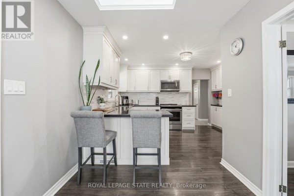 Furnace, water heater, and storage in basement - 473 Mohawk Road W Hamilton