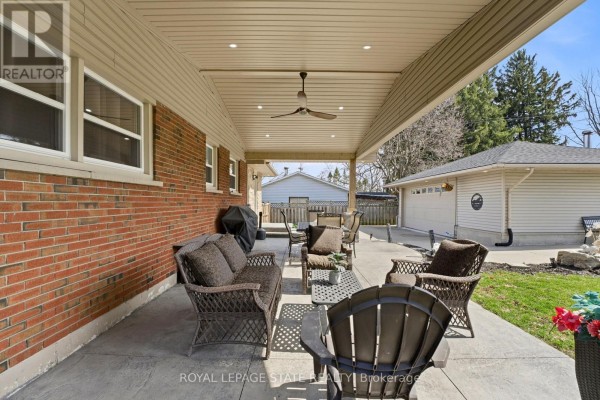 Office with desk, chairs, filing cabinet, and printer - 473 Mohawk Road W Hamilton