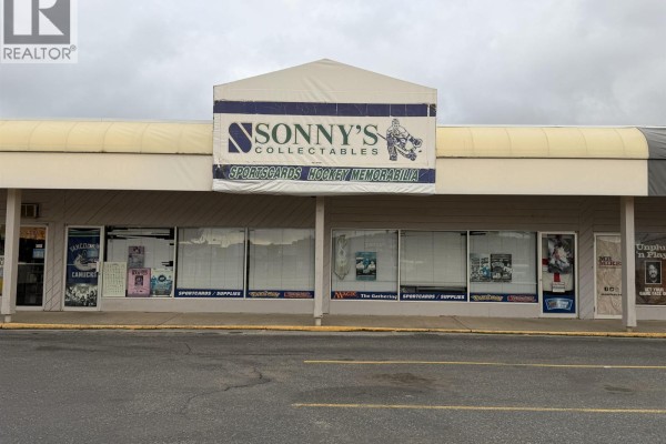 Close-up of "Sonny's Collectables" storefront with display windows showing merchandise. - 4736 Lakelse Avenue, Terrace