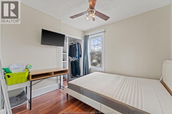 Backyard with shed, paved patio, and grill - 475 Mckay Avenue Windsor