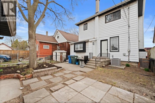 Hallway with open door to room with mattress and ceiling fan - 475 Mckay Avenue Windsor