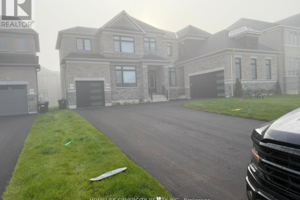 Front exterior view of a large, modern house on a foggy day. - 48 Marigold Boulevard, Adjala Tosorontio