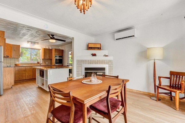 Kitchen with light wood cabinets, stainless steel appliances, and butcher block island. - 48 Rue St-josaphat, Gatineau