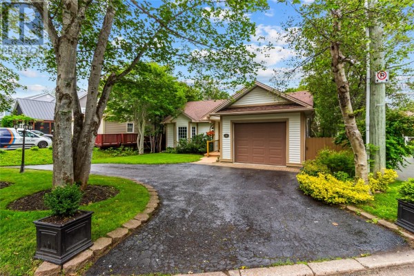 Close-up view of the house entrance at 48 Squires Avenue with a welcome mat. - 48 Squires Avenue, St  John S