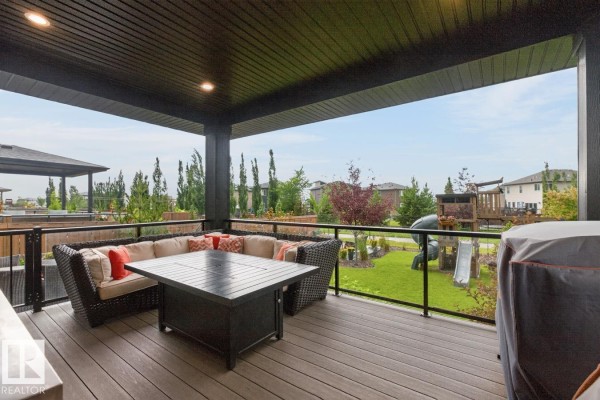 Family room - 486 Mcallister Pl, Leduc, AB T9E0S7 Photo 4