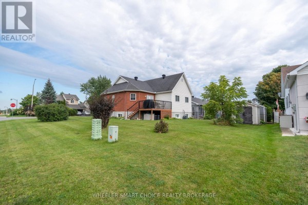 Backyard with lawn, deck, and shed - 49 Barnhart Drive South Stormont
