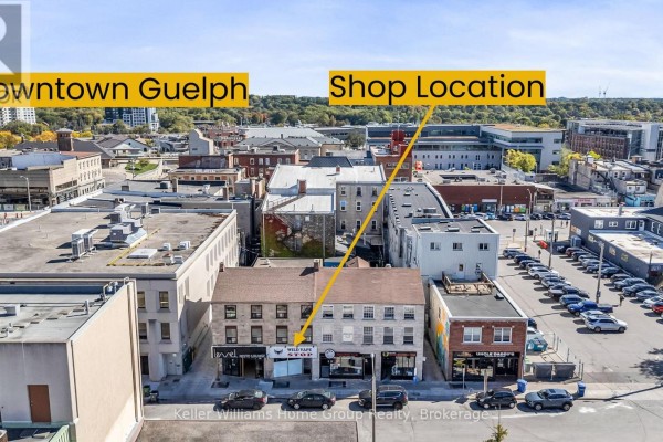 Aerial view of downtown Guelph, highlighting the location of 49 Cork Street E with an arrow. - 49 Cork Street E, Guelph
