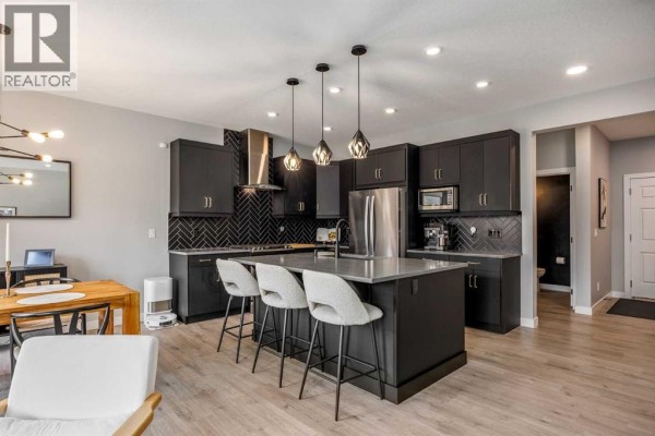 Living room - 49 Seton Mews Se, Calgary, AB T3M3C6 Photo 4