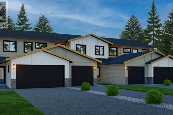 Rendering of three attached townhouse units, each with an attached garage. - 4906 Thouret Road, Out Of Province_alberta
