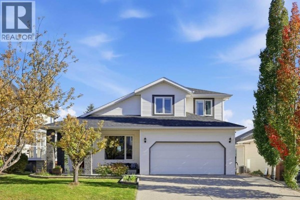 Living room - 5 Riverview Court, Cochrane, AB T4C1K6 Photo 5