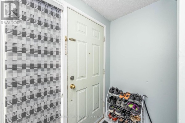 Bedroom 2 - 50 - 7475 Goreway Drive, Mississauga, ON L4T3T3 Photo 5