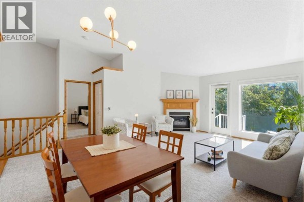 Living room - 50 Douglasview Park Se, Calgary, AB T2G5T2 Photo 3