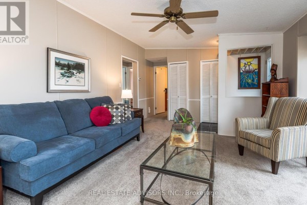 Shuffleboard court and pool area with covered seating - 50 Juno Crescent Georgina