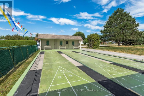 Two-car garage and sunroom on house number 50 - 50 Juno Crescent Georgina