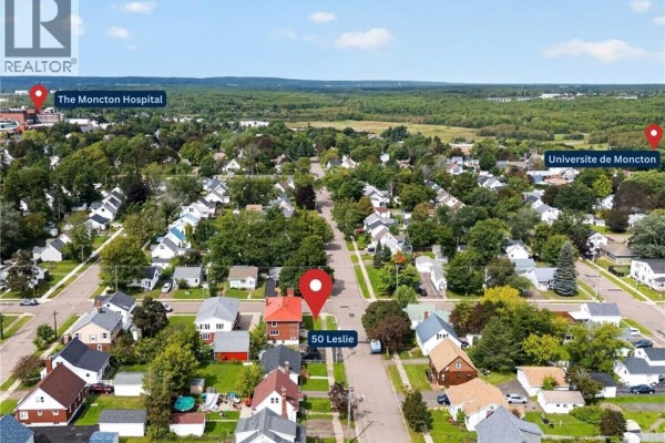 Aerial view of 50 Leslie, Moncton, highlighting proximity to The Moncton Hospital and Université de Moncton. - 50 Leslie, Moncton