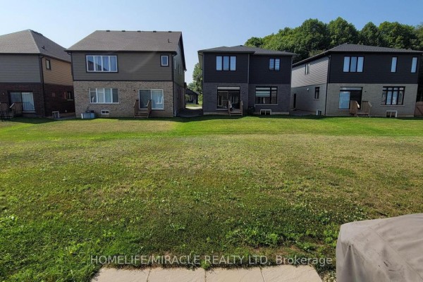 Unfinished basement with furnace, storage, bicycles, and exercise equipment. - 50 Lymburner Street, Pelham