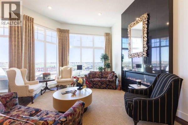 Living room - 50 Palisades Mews Ne, Medicine Hat, AB T1C2B5 Photo 4