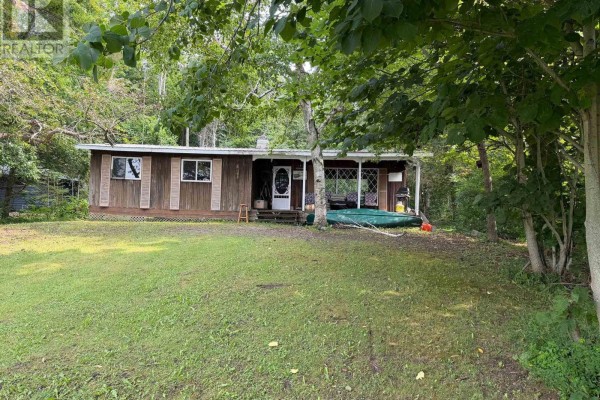 Dock with outdoor seating, gazebo, and lake access. - 50 South Fork Drive, Kawartha Lakes