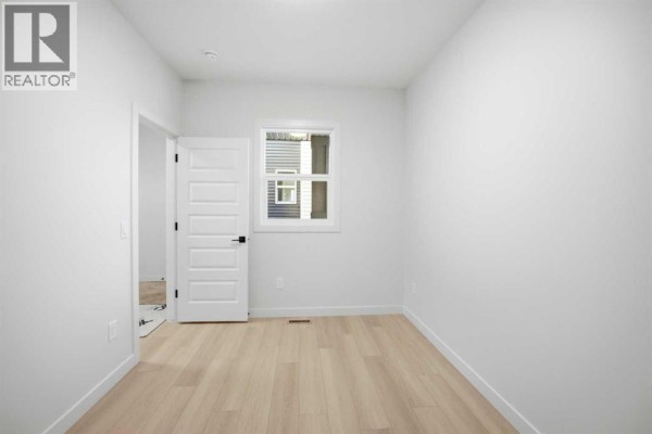 Laundry room - 50 Waterford Mews, Chestermere, AB T1X3B6 Photo 5