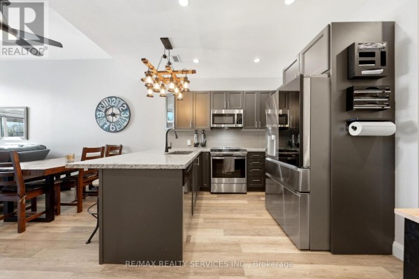 Living room - 501 - 80 Horseshoe Boulevard, Oro Medonte, ON L4M4Y8 Photo 5