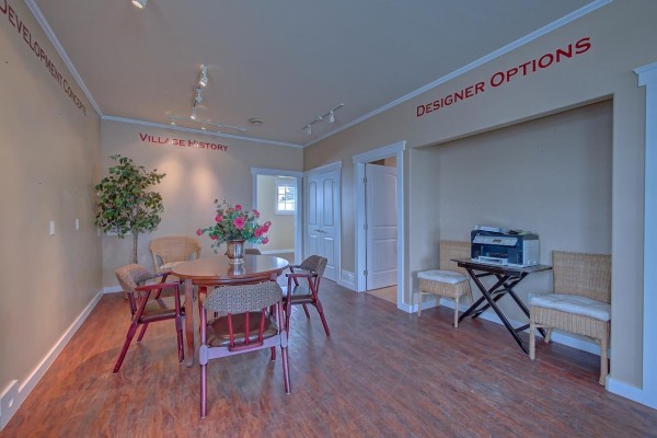 Small office space with a desk, window, and wooden flooring. - 5015-50 Street, Chipman
