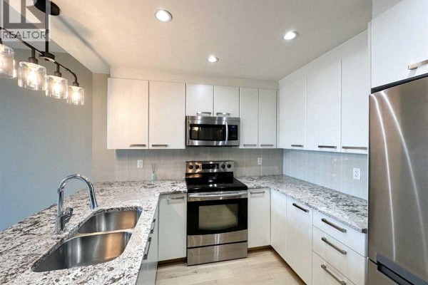 Laundry room - 502, 225 11 Avenue Se, Calgary, AB T2G0G3 Photo 2