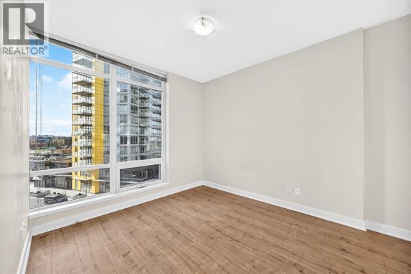 Living room - 502, 30 Brentwood Common Nw, Calgary, AB T2L2J9 Photo 5